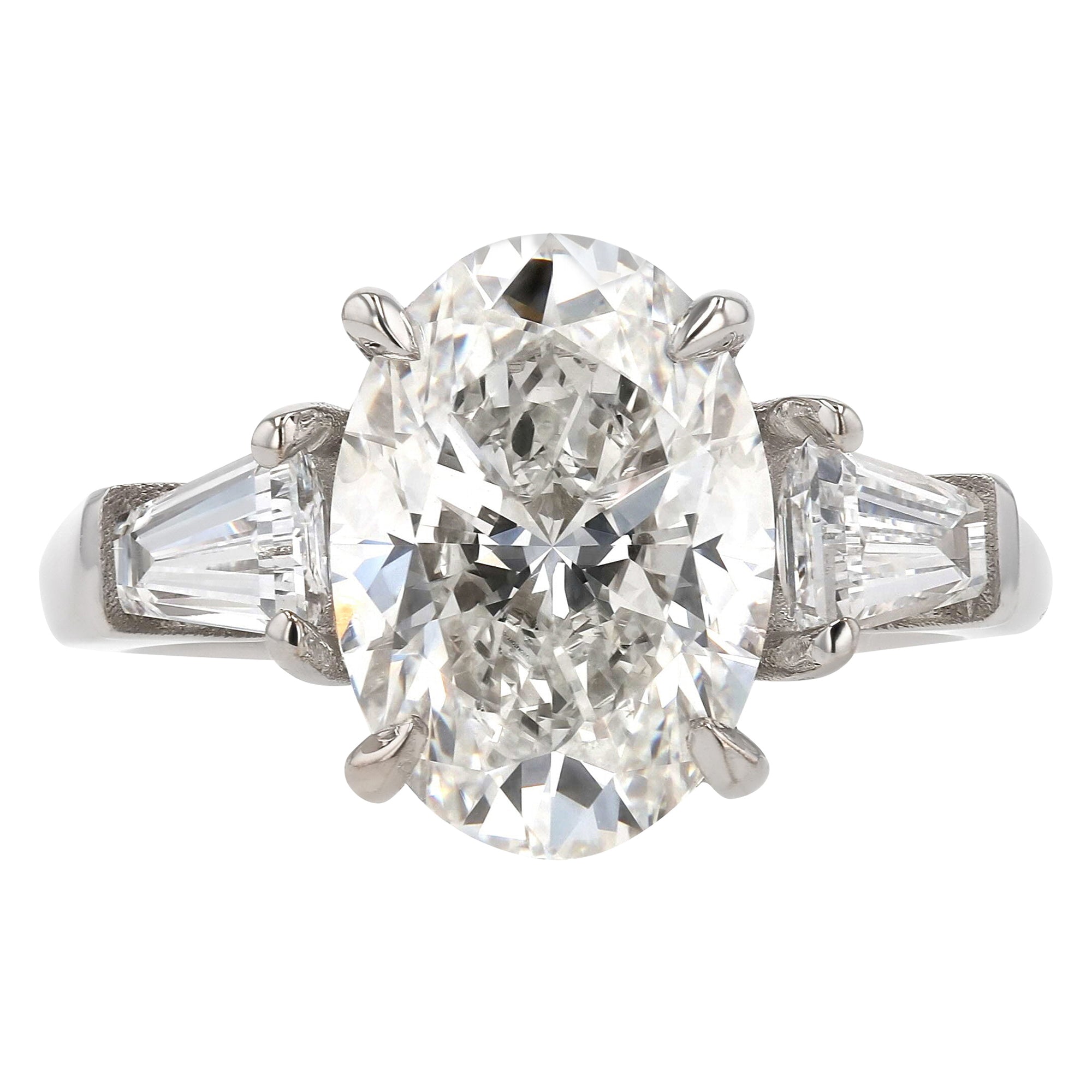 Three Stone Oval Taper Baguette Side Stone Ring 4.06Ct
