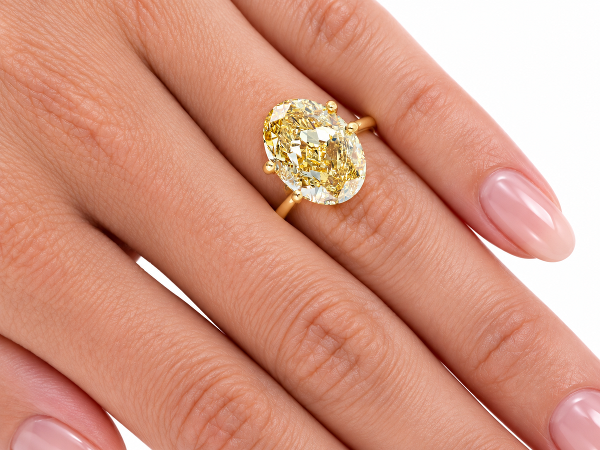 10.85ct Oval-  Fancy Vivid Yellow VS2 EX EX None